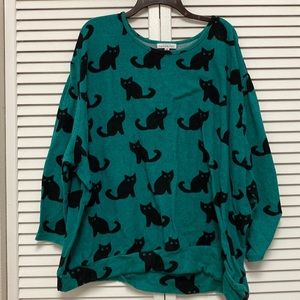 Green and cat sweater